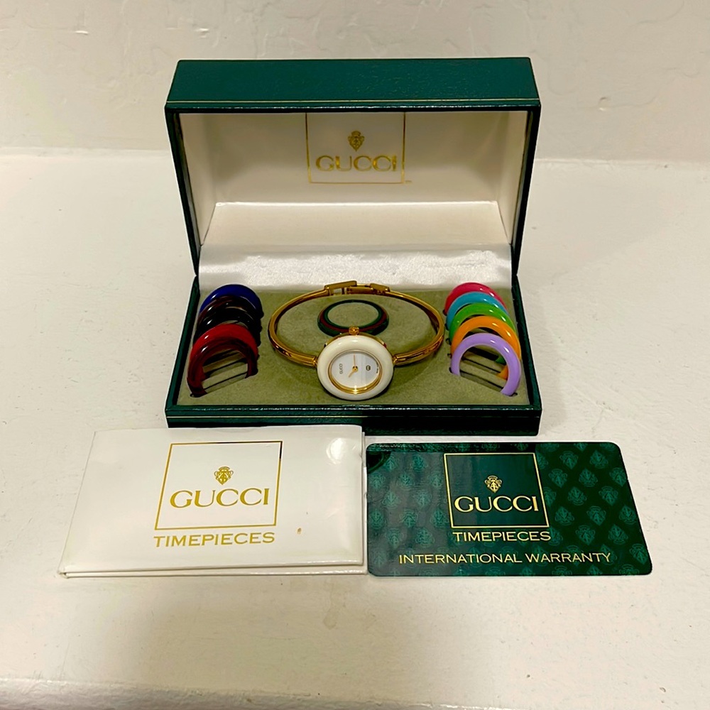 Vintage Gucci 12 bezel watch with guarantee card